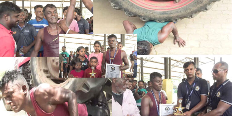 ට්‍රැක්ටර් 100ක් තම ශරීරය මතින් ධාවනය කරමින් වාර්තාවක් තැබූ පුෂ්පකුමාර