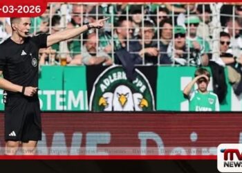 ජර්මානු පාපන්දු තරගයක්  අතරතුර මුහුණු ආවරණය කළ  ප්‍රේක්ෂකයෙකු VAR තිරයේ වයරය ගලවා දමයි